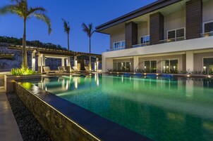 Outdoor pool, open 7:00 AM to 10:00 PM, pool umbrellas, sun loungers