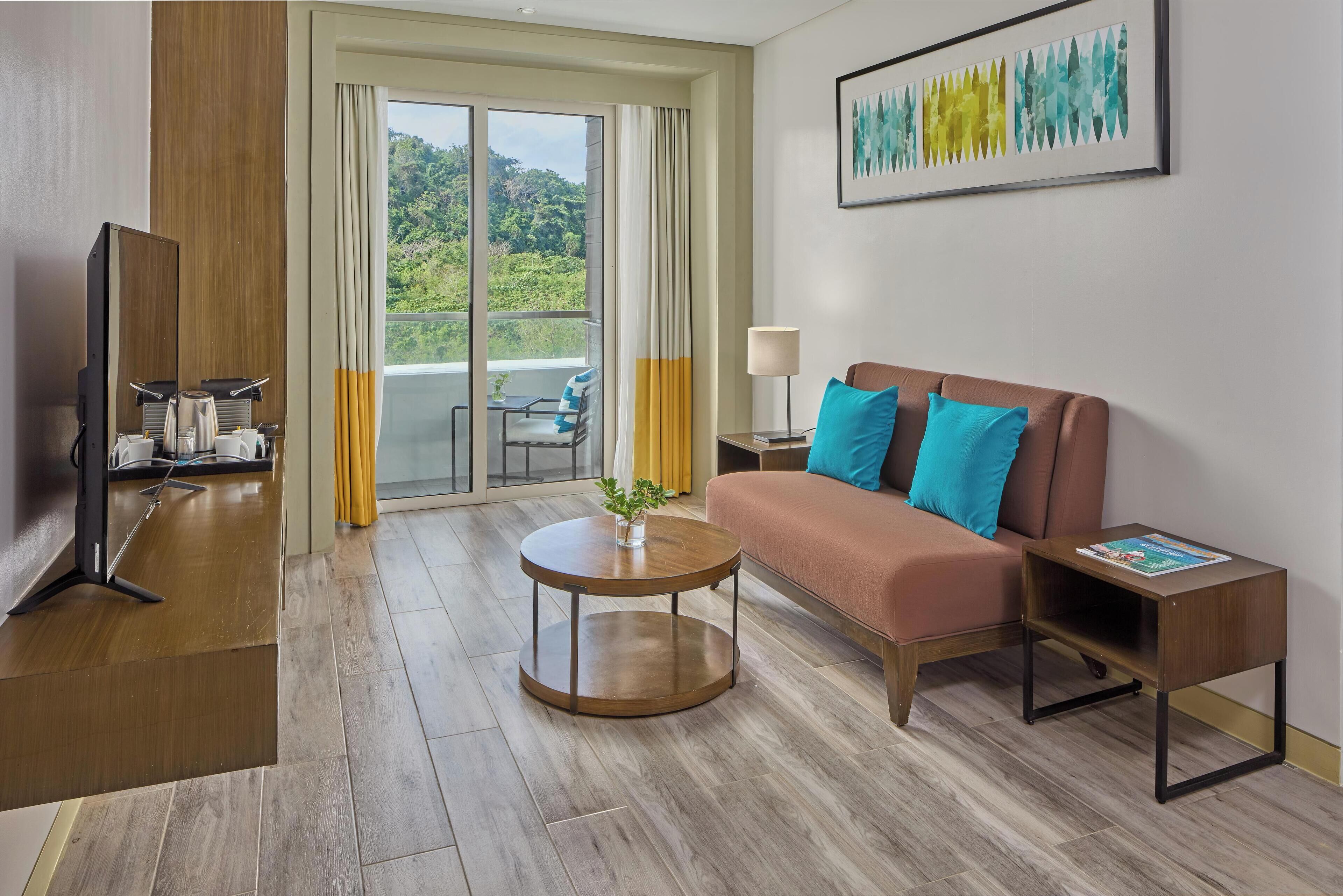 one bedroom executive suite with living room | living area | flat-screen tv