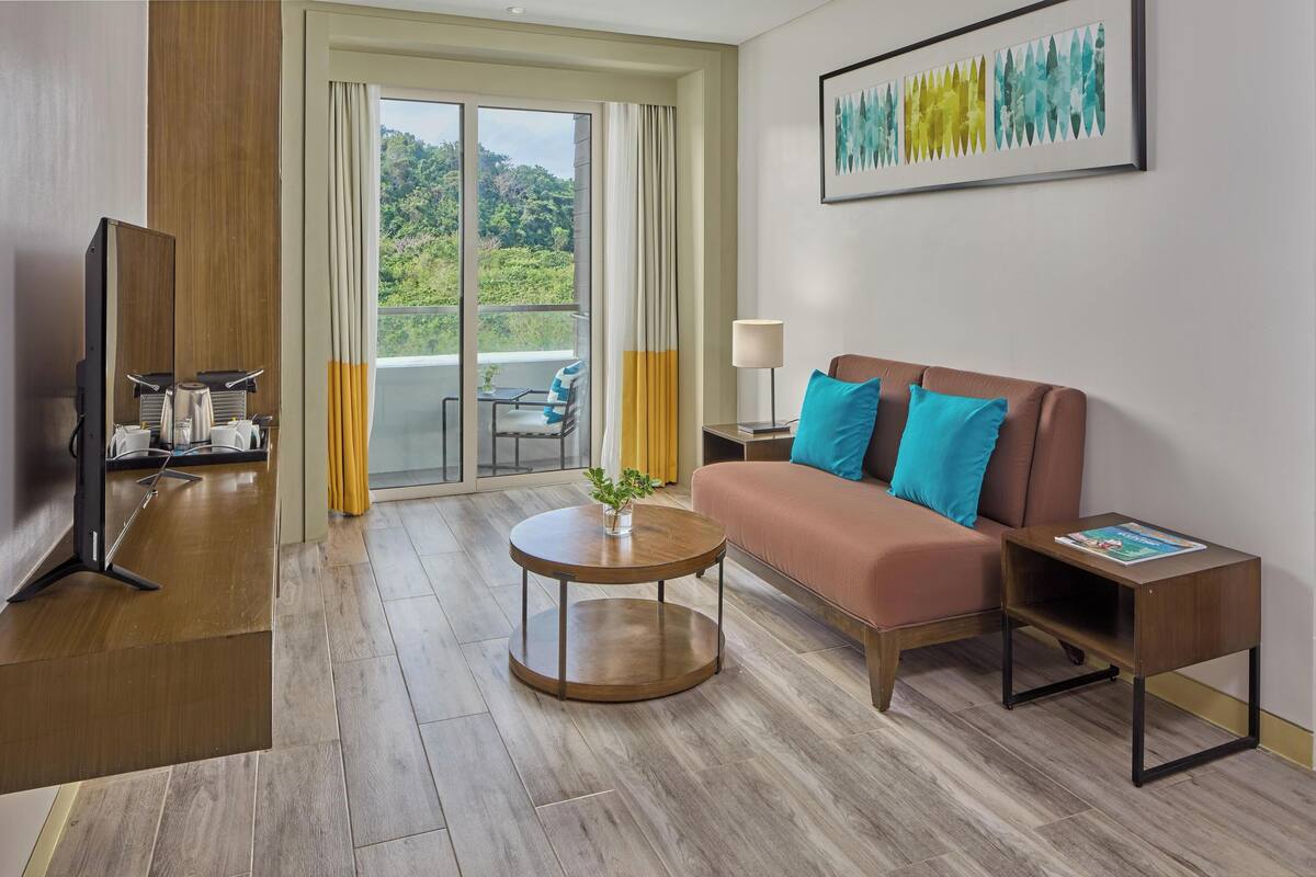 one bedroom executive suite with living room | living area | flat-screen tv