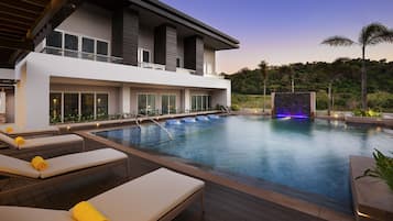 Outdoor pool, open 7:00 AM to 10:00 PM, pool umbrellas, pool loungers
