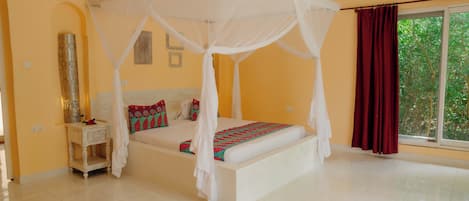 Deluxe Bungalow, Garden View | 1 bedroom, in-room safe, desk, soundproofing