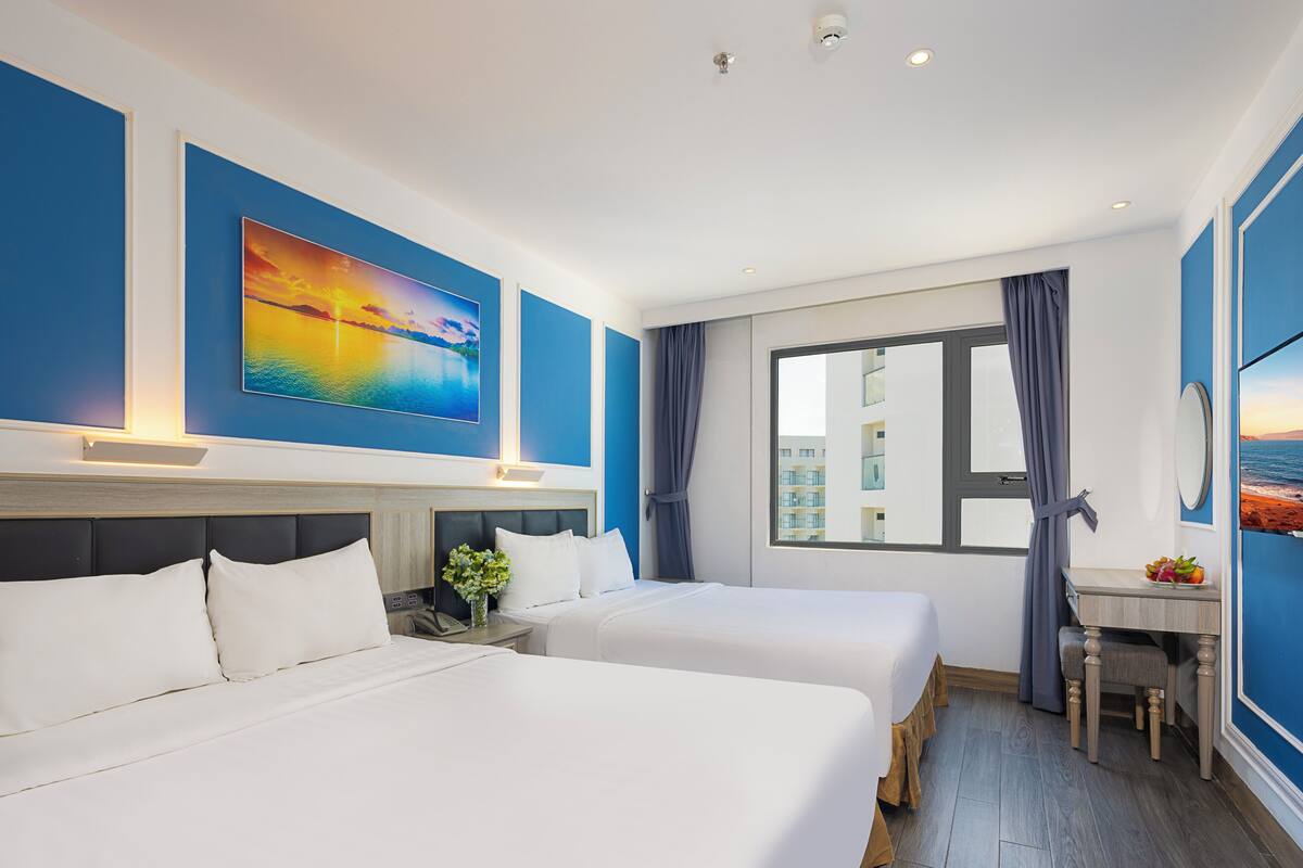 Family Room, City View | Premium bedding, down duvets, pillow-top beds, minibar