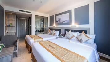 Deluxe Quadruple Room, City View | 1 bedroom, premium bedding, down duvets, pillow-top beds