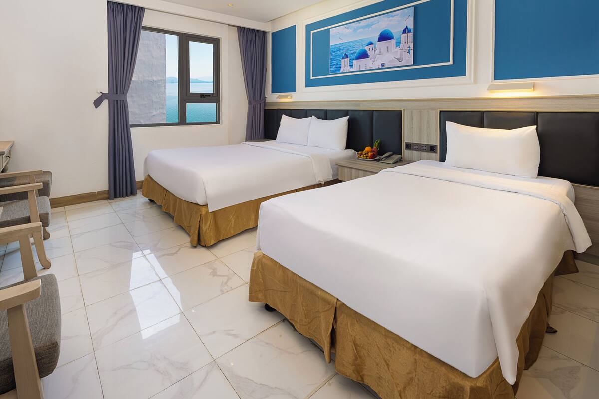 Executive Triple Room, City View | Premium bedding, down duvets, pillow-top beds, minibar
