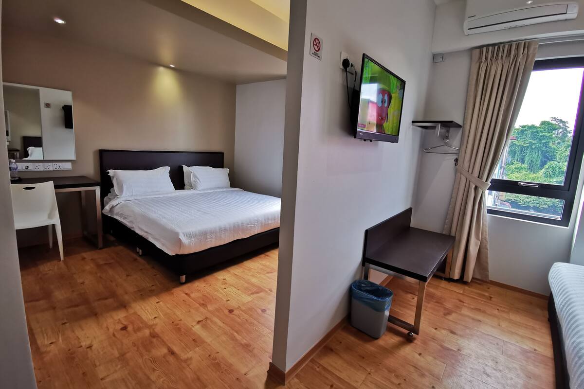 Family Room | Desk, blackout drapes, iron/ironing board (on request), WiFi (free)