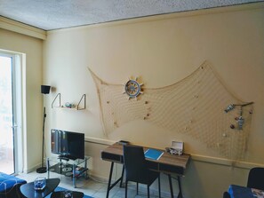 Comfort Apartment, Multiple Beds, Balcony, Sea View | Living area | 32-inch LCD TV with digital channels, TV