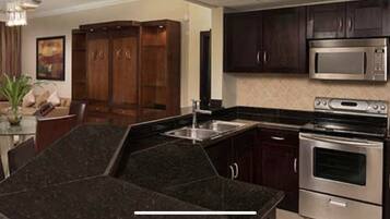 Microwave, coffee/tea maker, cookware/dishes/utensils