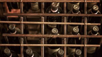 A wine rack with bottles of wine.