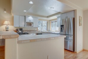 Huis, 3 slaapkamers | Privékeuken | Een koelkast, een magnetron, een oven, een kookplaat