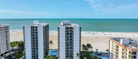 On the beach, sun loungers, beach towels