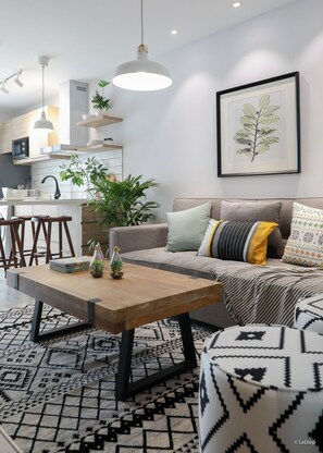 Superior Apartment | Living area | 43-inch TV with cable channels - Gardenia Bich Cau Serviced Apartment (Hanoi)