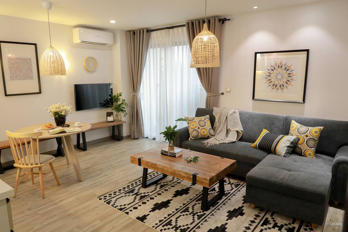 Superior Apartment, 2 Bedrooms | Living room | 43-inch TV with cable channels