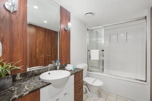 Combined shower/bathtub, hair dryer