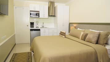 1 dormitorio, tabla de planchar con plancha, wifi gratis y ropa de cama