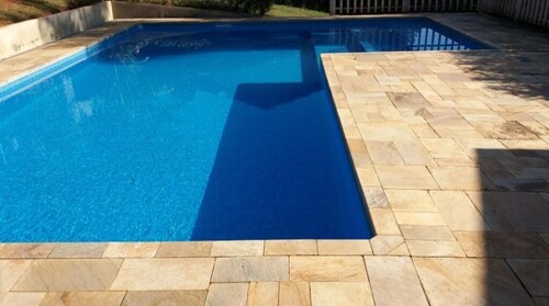 House in verdant paradise with golden lake, gated community