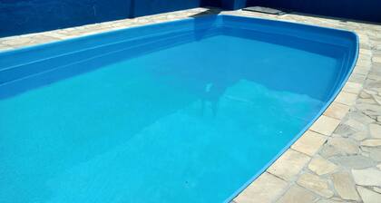 loco house with pool lit. North
