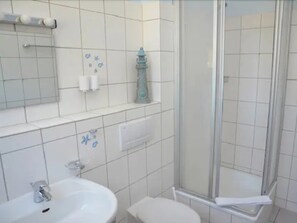 Departamento | Baño | Regadera y toallas 