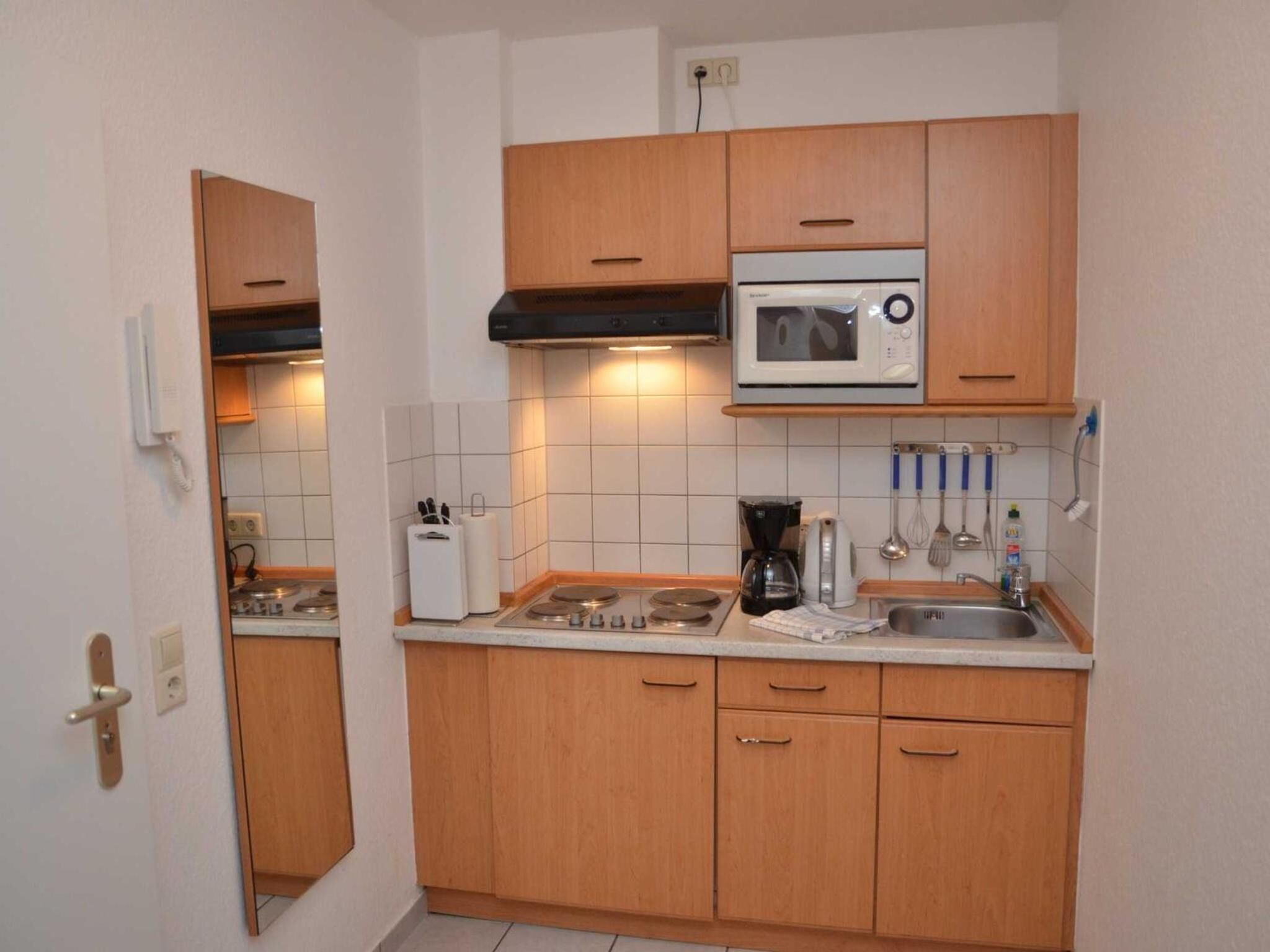 Full-sized fridge, microwave, stovetop, electric kettle