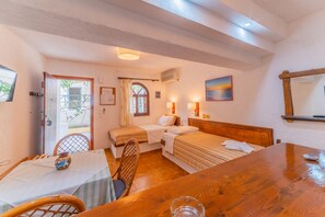 Grand Apartment, Accessible | Living area | Flat-screen TV - Kastro Studios Apartments (Ierapetra)