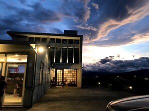 A modern building with large windows and a flat roof. - Jia's Home (Zhuangwei)