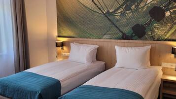 Premium suite | Een kluis op de kamer, verduisterende gordijnen