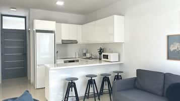 Apartment, Sea View | Private kitchen | Full-sized fridge, microwave, oven, stovetop
