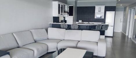 Apartment 504 | Living area | Flat-screen TV