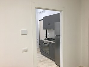 Private kitchen - Apartment with wifi (fiber 1000), bed and sofa bed 2 steps from the center (Bologna)