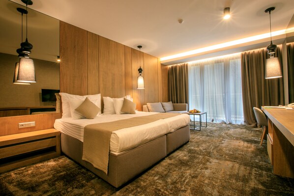 Superior Double Room | Minibar, in-room safe, desk, laptop workspace