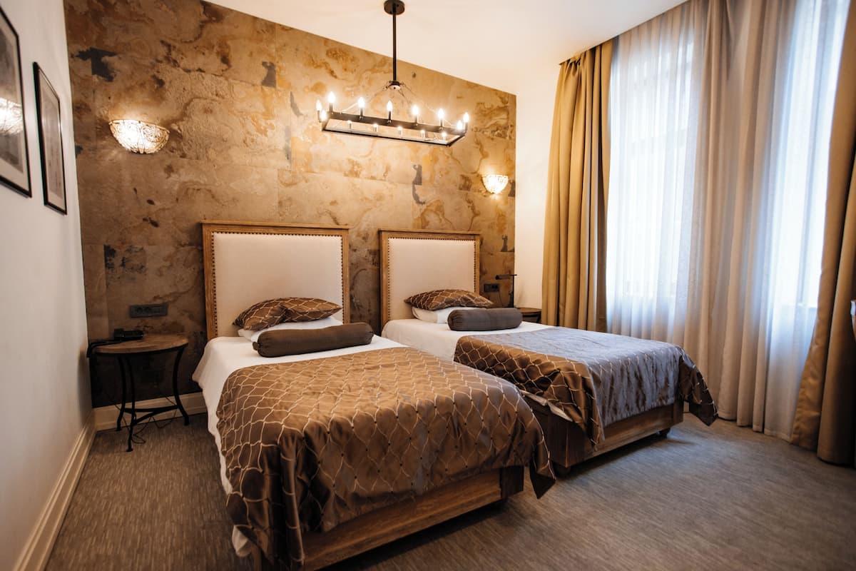 Premium bedding, minibar, desk, soundproofing