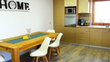 Grand Apartment, Balcony, Garden View (Elena) | In-room dining