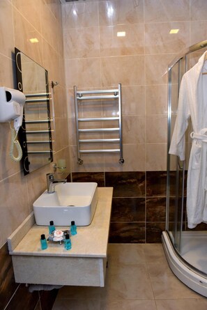 Shower, free toiletries, hair dryer, bathrobes