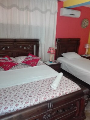 Quarto triplo standard | Frigobar, cortinas blackout, ferros/tábuas de passar roupa