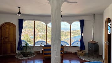 Superior Triple Room, Fireplace, Lake View | Individually decorated, individually furnished, soundproofing, free WiFi