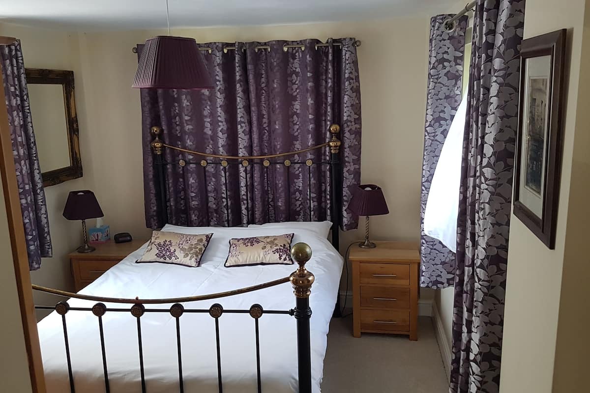 Individually furnished, desk, laptop workspace, iron/ironing board