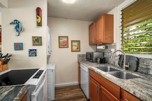 Fridge, microwave, oven, stovetop - Island Retreat With Ocean Views from Sunset Kahili 402 (Po'ipu)