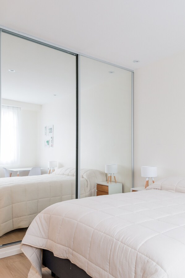 1 غرفة نوم وستائر تعتيم وواي فاي مجانًا وملاءات أسرّة