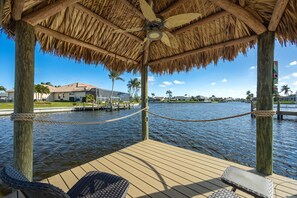 Terrace/patio - Lovely waterfront gulf access, heated pool in SW Cape Coral awaits you. (Cape Coral)