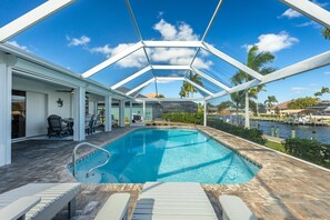A heated pool - Lovely waterfront gulf access, heated pool in SW Cape Coral awaits you. (Cape Coral)