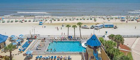 On the beach, sun loungers, beach towels