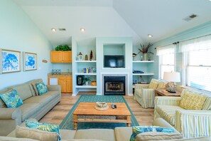 Télévision, cheminée, lecteur de DVD