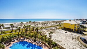 A resort with a swimming pool, beach access, and a view of the ocean. - P5-0503 Stunning Gulf Front Terrace Sunset Views! (Pensacola Beach)