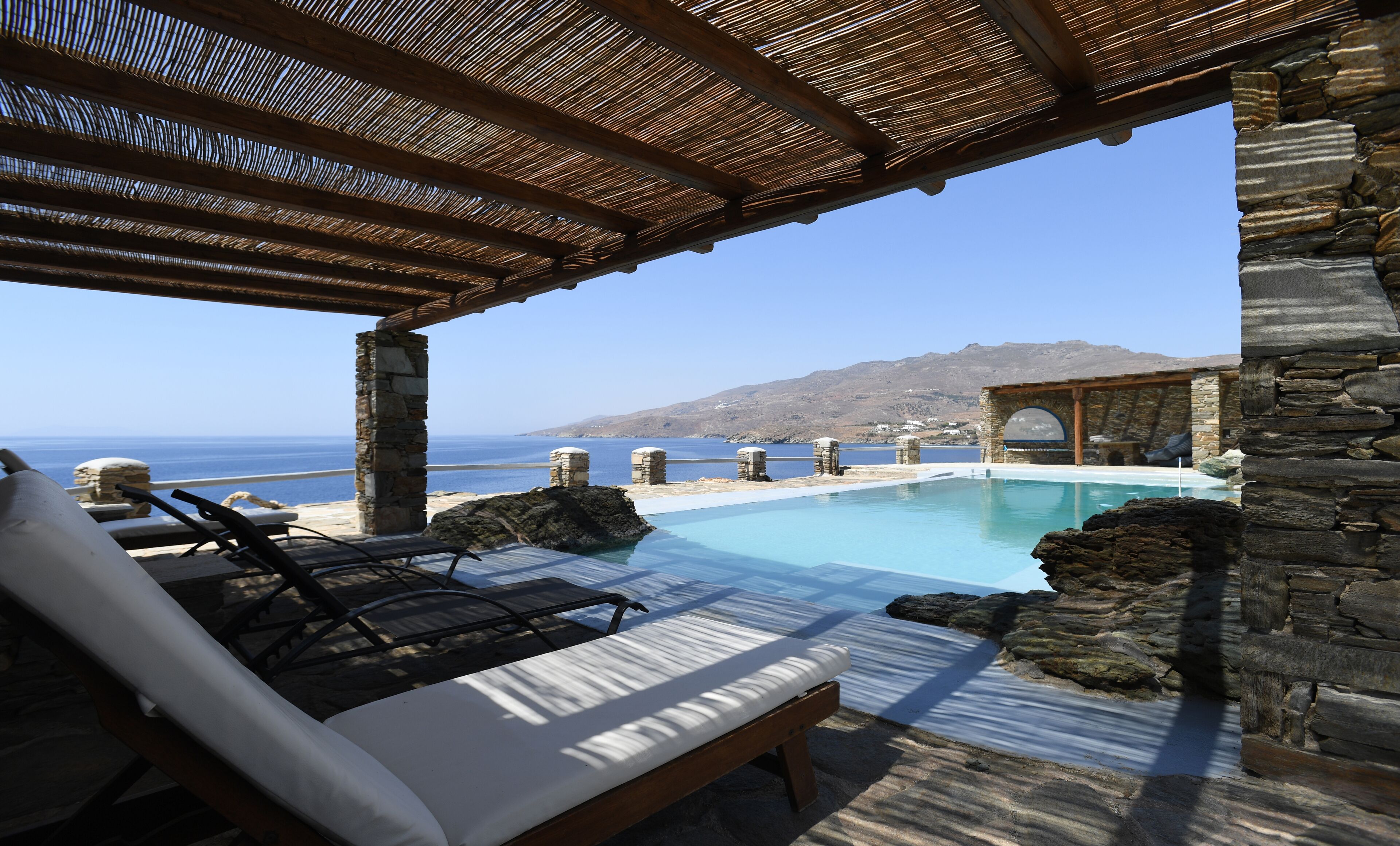 Should I stay at the pool or jump in the Aegean? That is the question!