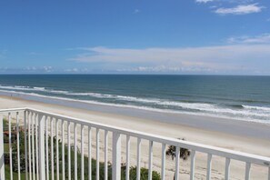 On the beach, sun-loungers, beach towels