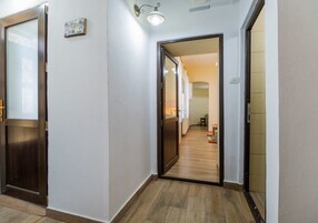 Classic Apartment | Living area | Flat-screen TV