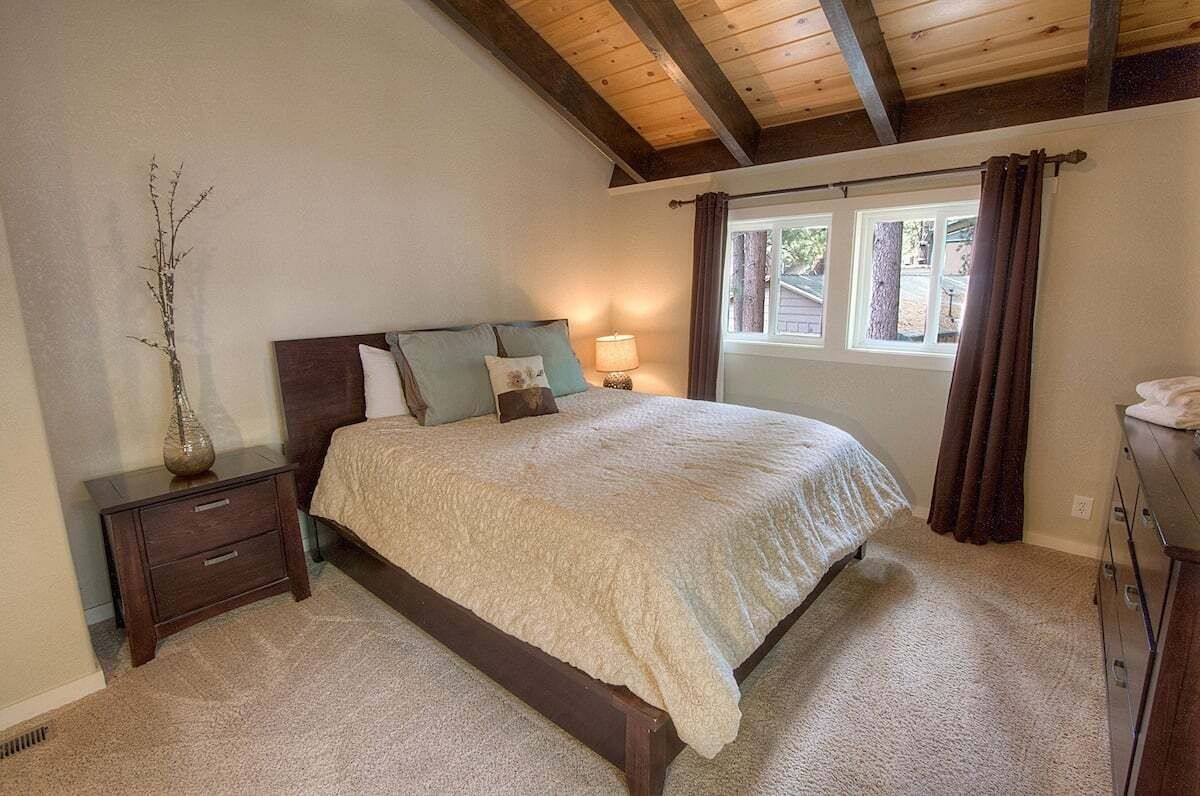 Read by the bedside lamp before sinking into the king bed.