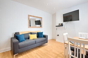 Comfort House, 4 Bedrooms | Living area | Flat-screen TV - Amazing Views of the City (Swansea)