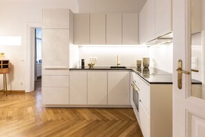 Fridge, microwave, stovetop, coffee/tea maker