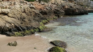 On the beach, sun loungers
