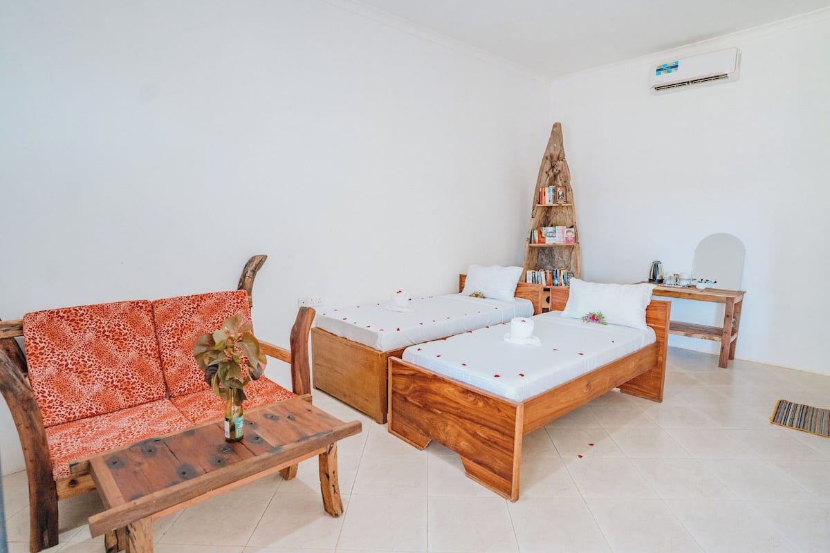 Chambre Deluxe avec lits jumeaux, 2 lits une place, vue piscine